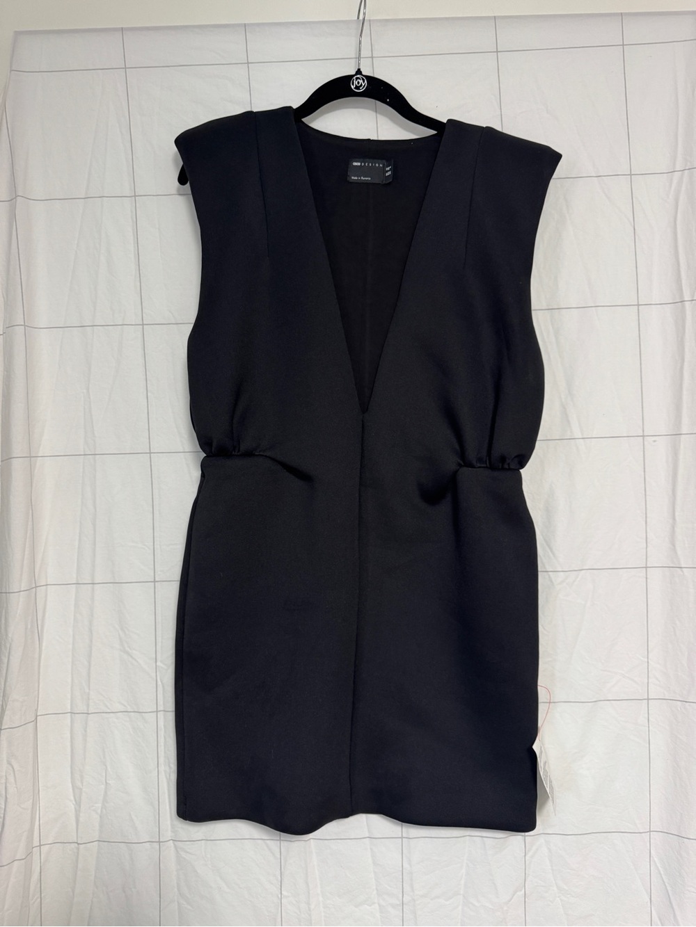 ASOS DESIGN structured plunge mini dress with shoulder pads in black